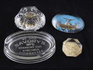 A Victorian octagonal paperweight decorated "The Brighton Sea Train", 2 advertising paperweights for Falcon Make Headwear and We Sell Savouries No.2 and 1 other paperweight