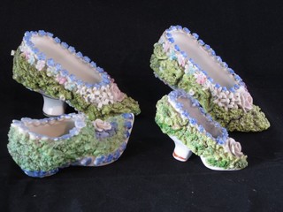 4 various 19th Century porcelain floral encrusted ornaments in the form of shoes