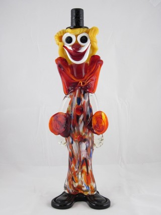 A Murano glass figure of a standing clown playing cymbals 14"