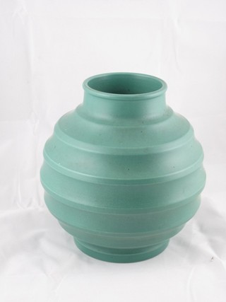 A cylindrical green glazed Wedgwood Keith Murray vase 8"