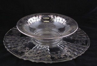 A circular pedestal glass bowl with silver overlay 9" together with a similar dish