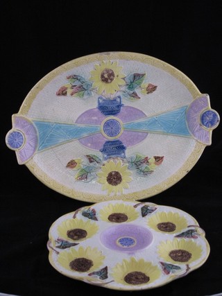 A Victorian Majolica twin handled tray 15", cracked, together with a circular Victorian Majolica dish 10"