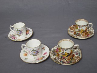 A 12 piece Royal Crown Derby posies pattern coffee service comprising 6 coffee cans and 6 saucers, the base marked XXX III, together with a Royal Crown Derby 10 piece Olde Avesbury pattern coffee service with 5 coffee cans and 5 saucers