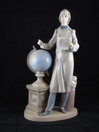 A Lladro figure of a man standing by a Globe - Maestro de Antano no 5.20, boxed ILLUSTRATED