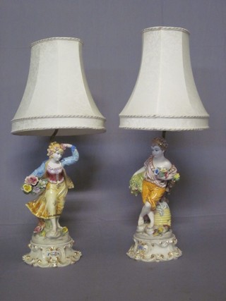 A pair of Italian pottery table lamps in the form of standing boy and girl 15", 1 f and r,
