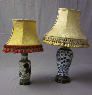 An Oriental blue and white porcelain vase converted for use as a table lamp 11" and 1 other Oriental vase 9", f and r,