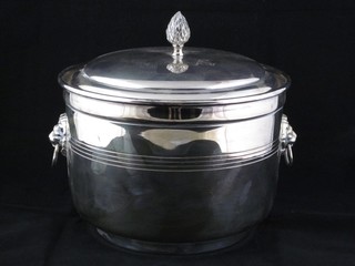 A circular silver plated twin handled ice pail