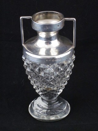 An Edwardian circular cut glass vase with silver twin handled mounts, Birmingham 1901, 4 1/2"
