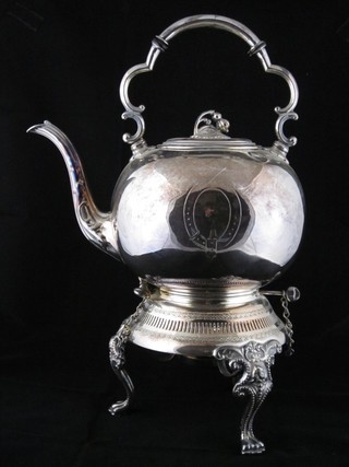 A silver plated spirit kettle complete with stand and burner
