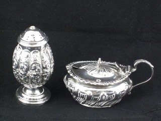 An Edwardian oval embossed silver mustard pot with hinged lid Birmingham 1908, together with an Eastern embossed white metal vinaigrette