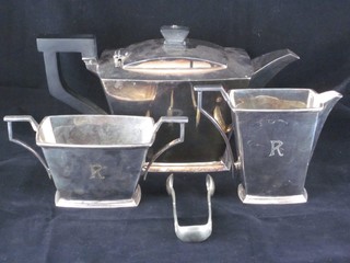 An Art Deco rectangular shaped 3 piece silver plated tea service comprising teapot, twin handled sugar bowl and milk jug