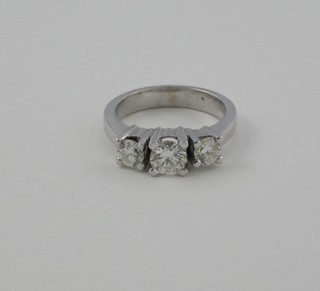 A lady's 18ct white gold dress ring set 3 diamonds