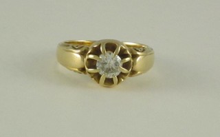 An 18ct gold gypsy dress ring set a diamond, approx 1/2 ct,