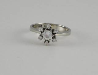An 18ct white gold cluster dress ring set diamonds