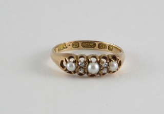 A lady's 15ct yellow gold dress ring set 3 pearls and diamonds