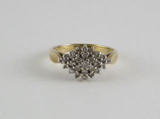 A lady's 9ct yellow gold cluster dress ring set diamonds