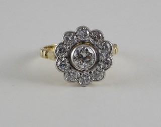 An 18ct gold yellow gold cluster dress ring set numerous diamonds, approx 1.55ct