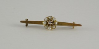 A 15ct gold bar brooch set pearls and diamonds