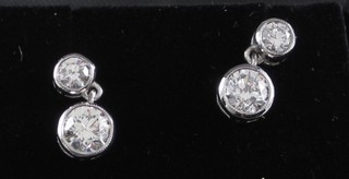 A pair of lady's diamond ear studs, approx 1ct