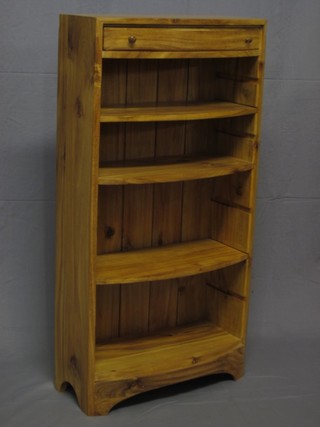 A Victorian style bleached mahogany bow front bookcase, the upper section fitted a drawer above 4 shelves, raised on bracket feet 20"