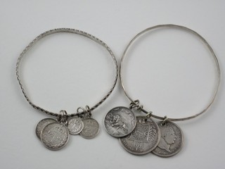 A silver bangle hung 4 1906 Maundy coins - 1 pence, tuppence and thruppence and 1 other bangle hung coins