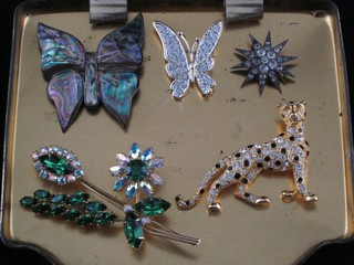 5 silver brooches