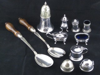 A silver plated sugar sifter, a 3 piece silver plated condiment set, a pair of silver plated salad servers and other plated condiments