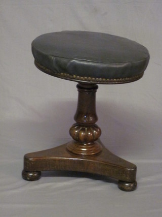 A William IV rosewood piano stool, raised on a tripod