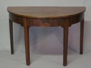 A 19th Century mahogany demi-lune side table, raised on square supports 40"