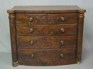 A Victorian mahogany bow front chest of 2 short and 3 long  drawers with columns to the sides 51"