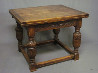 A carved oak drawleaf dining table 39"