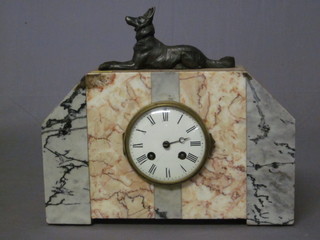 A 1930's French Art Deco 8 day striking mantel clock with  enamelled dial and Roman numerals contained in a 2 colour marble case surmounted by a spelter figure of a seated Alsatian,  minute hand missing,
