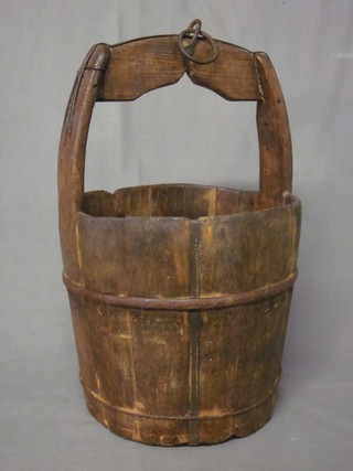 A wooden well bucket