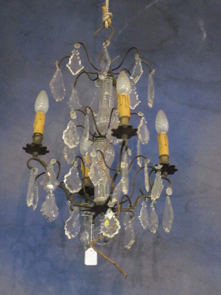 A gilt metal and glass 4 light French electrolier hung lozenges