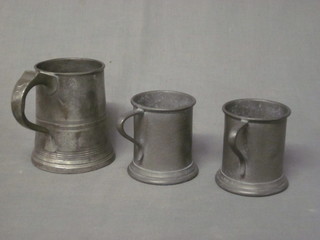 A George IV pewter pint measure together with 2 planished  pewter measures