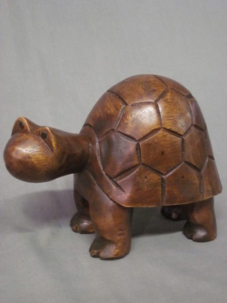 An Eastern carved hardwood figure of a tortoise, 10"