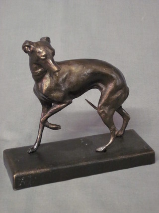A small bronzed figure of a standing greyhound, 7"