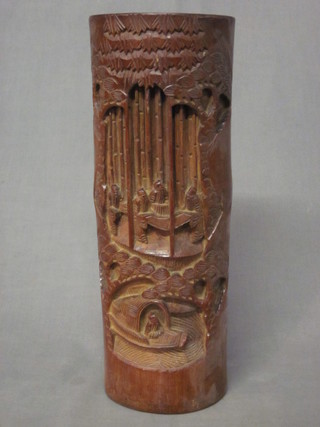 An Eastern vase carved from a section of bamboo 13"