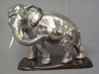 A spelter figure of a standing elephant 9"