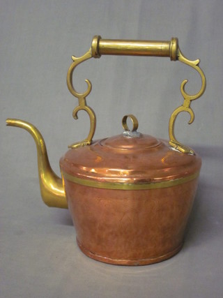 An Eastern copper kettle with brass handle and spout 10"