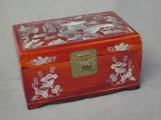 An Eastern hardwood jewellery box with hinged lid and inlaid mother of pearl decoration 9 1/2"