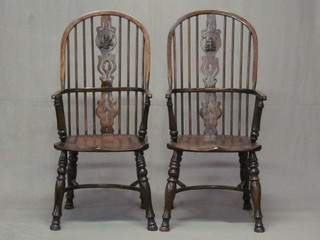 A pair of 18th Century style elm stick back Windsor chairs with  cow horn stretchers, the base dated 1989 and with brass plaque  marked Lefevre & Sons, Chair makers Oxford