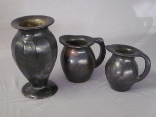 A South African carved hardstone vase 11" and 2 ditto jugs 7"