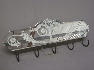 A Venetian style glass wall mounting coat rack 22"