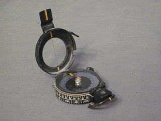A British Military issue compass by J M Glauser of London dated  1937