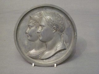 A 19th Century cast metal plaque circular depicting Napoleon  and Josephine marked Andrieu Fecit 5 1/2"