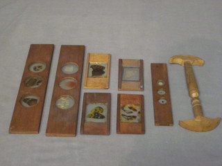 A 19th Century wooden hat stretcher and various wooden Magic Lantern slides