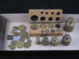 A collection of various brass weights