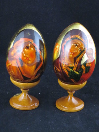 2, 20th Century turned and painted wooden Russian eggs  decorated Icons and dated '94 3"