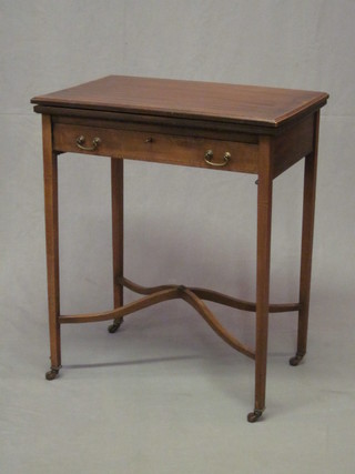 An Edwardian rectangular inlaid mahogany card table with  crossbanded top, the base fitted a drawer and raised on square tapering supports united by an X framed stretcher  24"